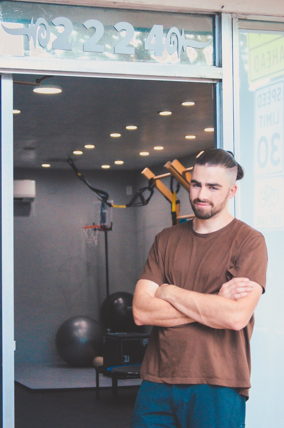 Alex Cunningham at the door of the Spring Well studio, 2224 10th Street, Sacramento